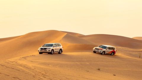 Desert Sunrise Safari in Abu Dhabi: Dune Bashing, Sand Boarding, Camel Ride