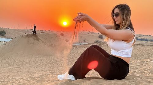 Red Dune Desert Safari with Camel Riding Sand Boarding BBQ Dinner Day Tours